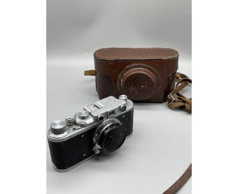 Early Leica style Russian camera and light meter.