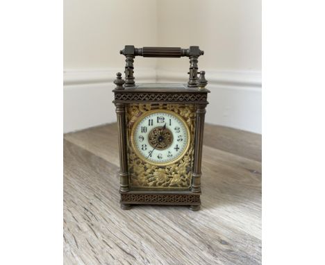 19th C ornate carriage clock, Arabic numerals and filigree floral front, original platform and mechanism working would benefi