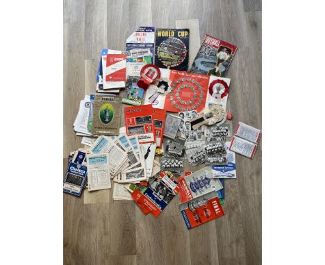 Qty Vintage football programmes and rosettes.