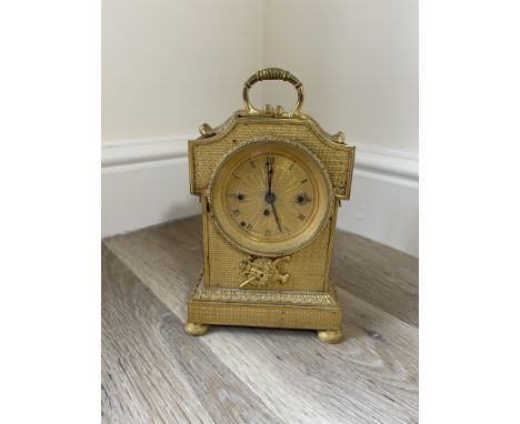 19th C French gilt mantle clock three winding ports, striking on a gong and bell., inner platform movement , dial marked "Roh