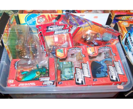 Nine various boxed or carded TV related action figures to include Doctor Who, Starship Troopers, and 2000 AD, examples to inc