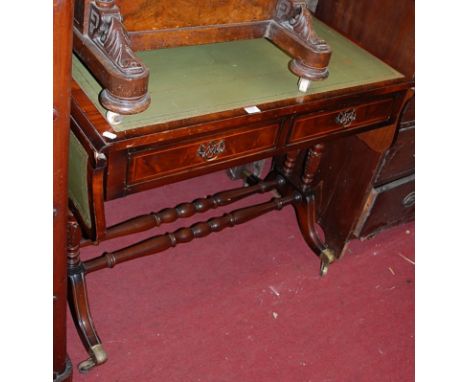 A reproduction mahogany and figured mahogany gilt tooled green leather inset drop-flap sofa table, having twin frieze drawers