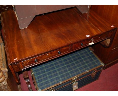 A 19th century mahogany round cornered dropflap sofa table, having twin frieze drawers and raised on scroll shaped end suppor