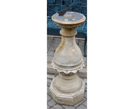 A reconstituted stone pedestal sundial having engraved metal top, height 100.5cm