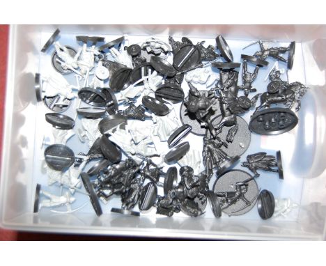 Two 3-drawer plastic sets containing a quantity of Warhammer Lord of the Rings