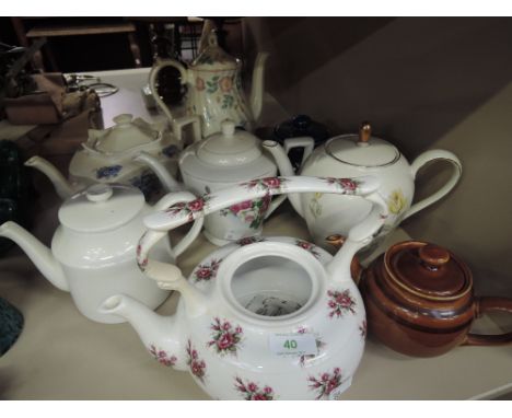 A collection of vintage tea pots