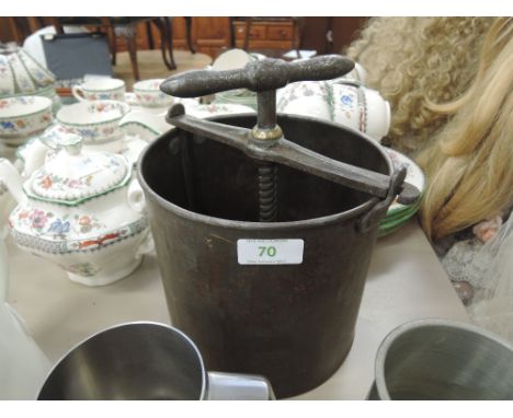 A vintage cheese press 