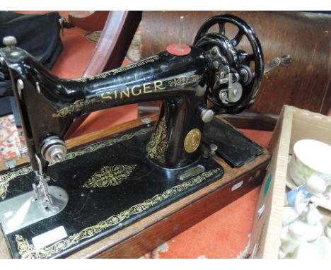 A vintage Singer sewing machine , hand crank, serial number Y5632879