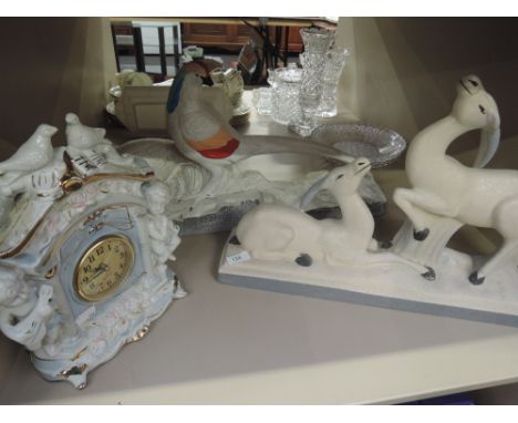 A ceramic mantle clock, two studies Pheasant and Orix