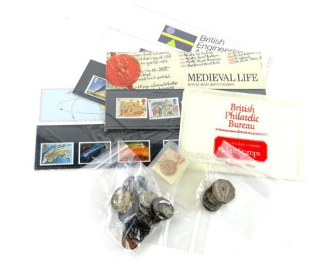 A small collection of mainly foreign coins, and three first day covers.