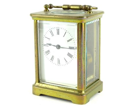 An early 20thC French brass carriage timepiece, with white enamel dial, 13cm H.