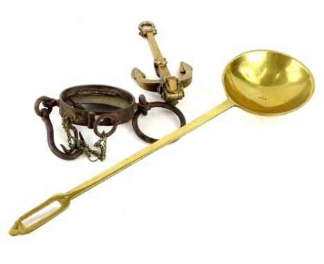 An unusual set of brass and iron hand scales, a brass working model of a ships anchor and a brass ladle. 