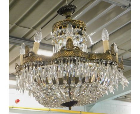 A basket type gilt metal chandelier, possibly Waterford, suspended with prismatic and other drops, 55cm H.