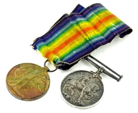 A pair of First World War medals, the 1914-18 medal and the Victory medal awarded to a Gunner Richardson of the Royal Artille