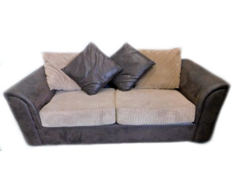 A brown simulated snakeskin leather two seater sofa, with corduroy cushions etc. 