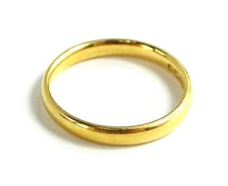 A 22ct gold wedding band, of plain design with maker's stamp W.W.LD, ring size M ½, 2.9g. 