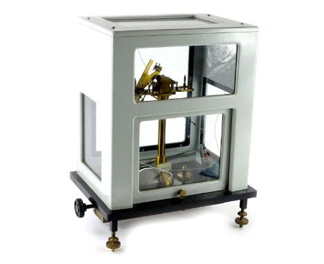 A set of City of Lincoln chemist type scales, with plaque bearing name S Garcia, London, adjustable brass feet etc., 37cm W.