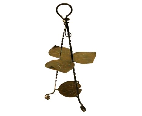 An unusual Art Nouveau copper and wrought iron cake stand, with triple petal effect stand to the top above a further under ti
