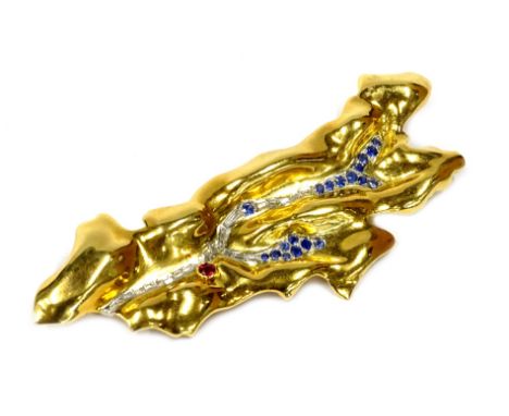 An Asprey &amp; Co abstract brooch, of elongated design set with sapphires, diamonds and a ruby, in gold coloured setting, un
