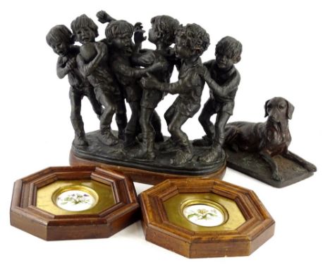 A bronzed resin sculpture after Barbara Holgate, depicting a collection of five young boys playing rugby, on a hardwood base,