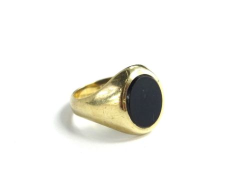 A 9ct gold signet ring, with maker's stamp JH, ring size K, set with black agate stone, 4.8g all in.