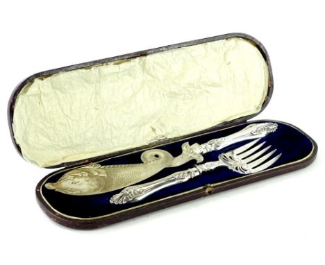A pair of fish servers, the blades stamped and engraved in the form of a fish and a five pronged fork with rococo scroll hand