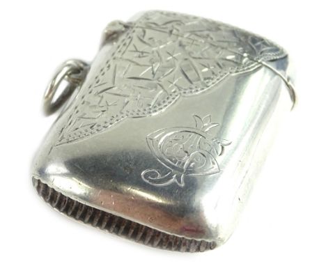 An Edwardian silver Vesta case, engraved with leaves etc., and with a monogram, Birmingham 1902 by Samuel M Levi, 20.5g.