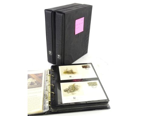 Three albums of WWF first day covers. 