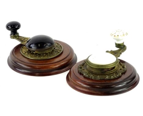 Two Victorian servants bell pulls, each with porcelain or enamel decoration, later mounted.