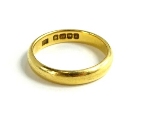 A 22ct gold wedding band, of plain design with maker's stamp S.P, ring size K, 3.9g all in. 