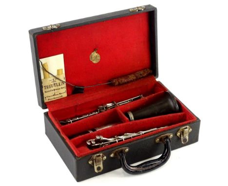 A Boosey and Hawks composition clarinet, in fitted case. 