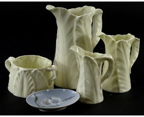 A collection of ceramics, to include three Royal Worcester leaf moulded jugs, a similar milk jug etc.