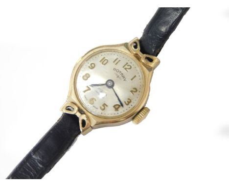 A 9ct gold Rotary ladies wristwatch, with small circular dial, with silvered colour dial, in 9ct gold frame, with bow type de