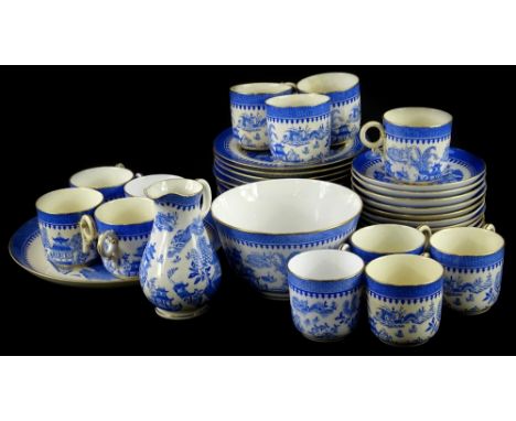 A Royal Worcester Willow pattern part tea service, printed in blue to include cups, saucers, etc.