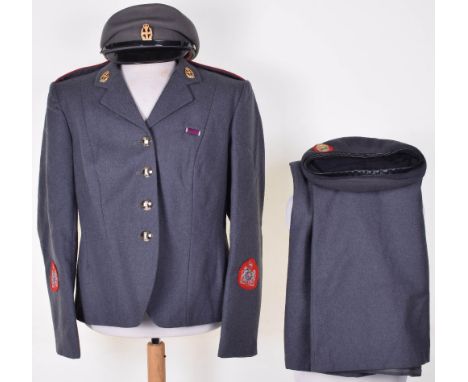 Queen Alexandria’s Royal Army Nursing Corps (Q.A.R.A.N.C) Warrant Officers Full Uniform, consisting of grey jacket with red p