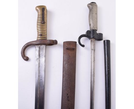 French Chassepot Bayonet, with brass ribbed one piece handle. Crossguard / muzzle ring stamped “T 93900” as is the top of the