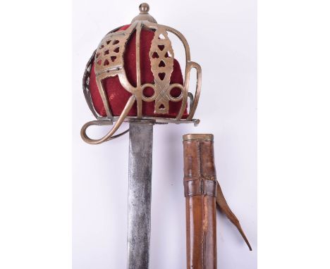 Decorative Scottish Basket Hilt Broadsword, 20th century, plain double edge blade, cast copper hilt with fabric liner, cast c