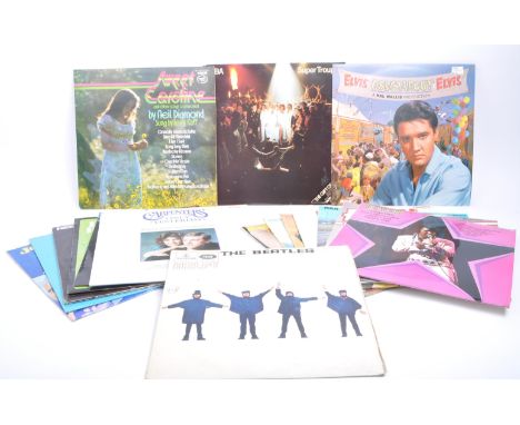 Collection of late 20th century rock and pop LP vinyl records. Comprising of Elvis compilations, Abba's 'Super Trouper', Neil