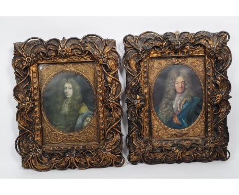 A pair of 20th century Regency Revival high relief carved gilded frames having scrolled rocaille and acanthus type motifs wit