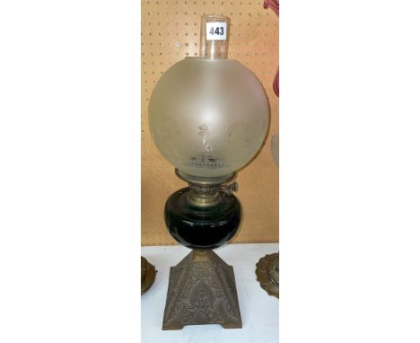 BOTTLE GREEN GLASS OIL LAMP WITH DECORATED BASE AND SHADE A/F