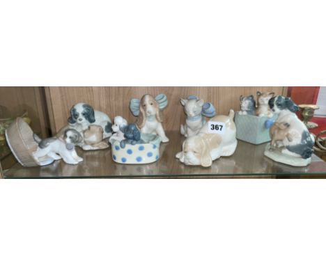 SHELF OF NAO DOG AND CAT FIGURE GROUPS X 8 SOME WITH BOXES