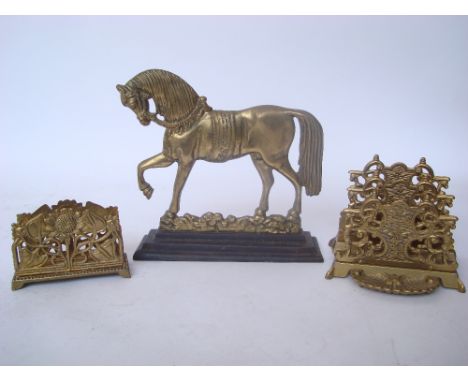 A gilt brass three division letter rack with pierced foliate design together with another gilt brass single letter rack with 