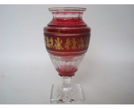 Val St Lambert ruby overlay cut crystal vase, decorated with a frieze of gilt decorated acid etched classical figures, on squ