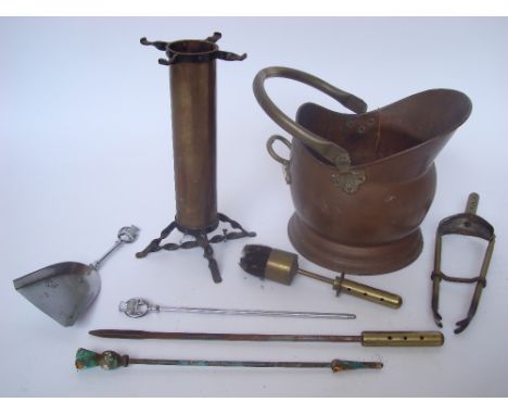 A brass helmet coal scuttle together with various fire tools etc. 