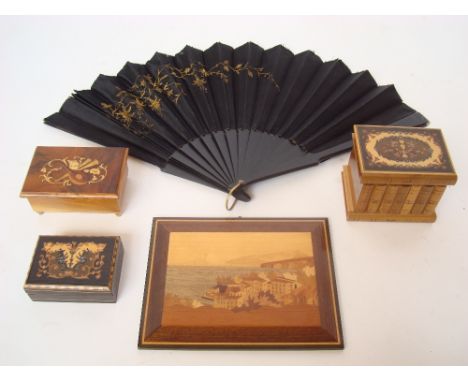 An Italian Sorrento Ware puzzle box, a marquetry panel with a view of the Bay of Naples and two trinket boxes together with a