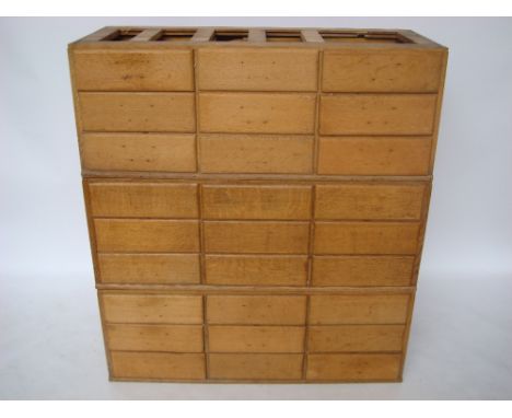 An early 20th Century American light oak Wabash Rival letter file cabinet by Rockwell & Rupel, Chicago, formed in three secti