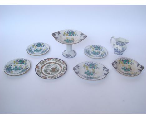 A Victorian Till and Son ironstone part dessert service comprising a high comport, an oval serving dish, a circular serving d