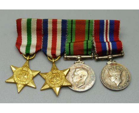 A set of WWII miniature medals including a Defence medal 