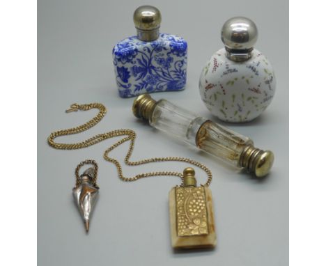 Five scent bottles; a blue and white porcelain scent flask, a Victorian clear glass double ended, white floral scent with pop