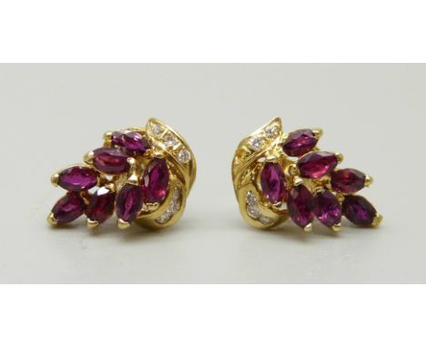 A pair of 18ct gold, ruby and diamond earrings, (odd fasteners, one marked 750), 3.2g 